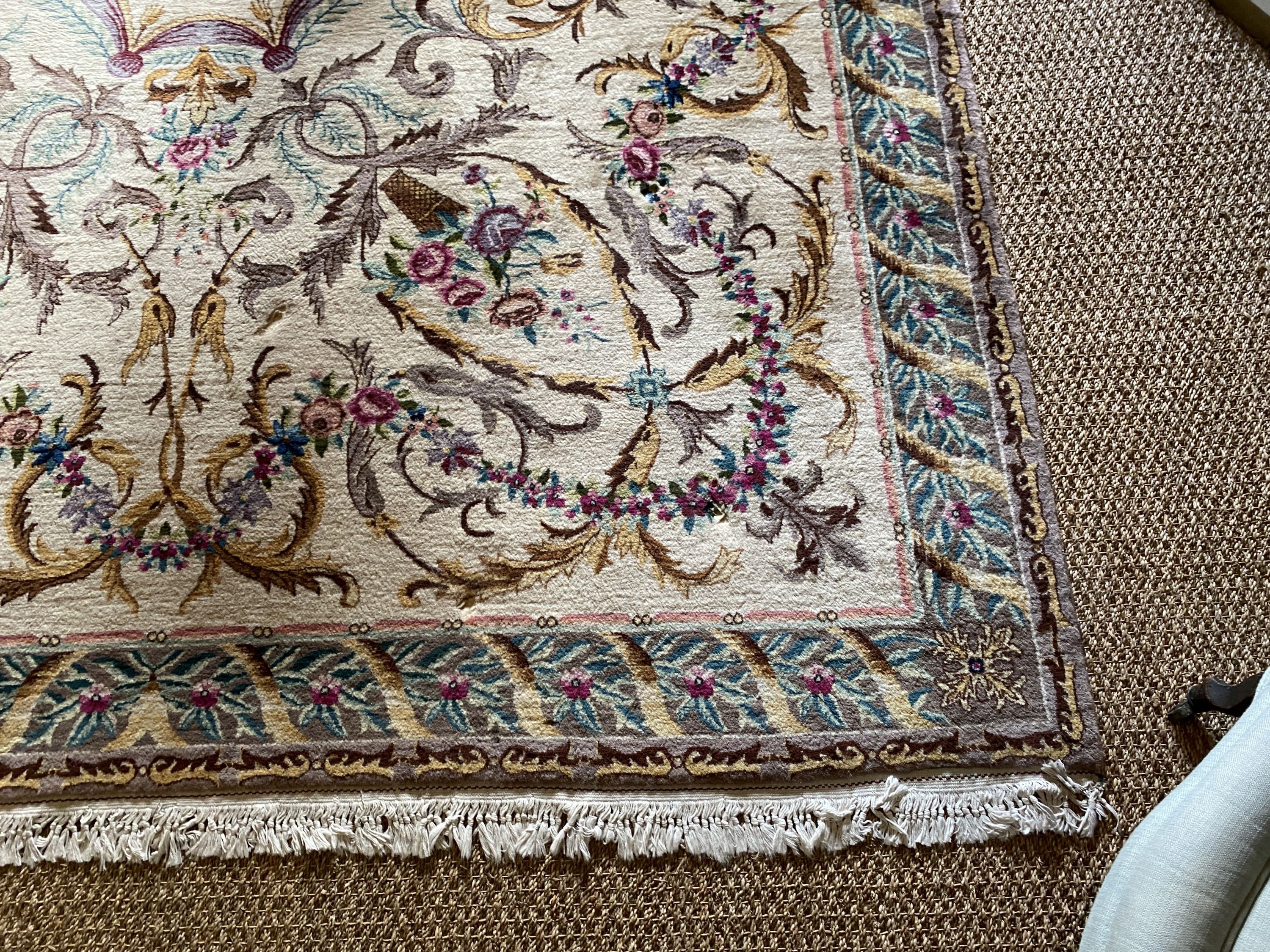 An Aubusson pattern cream ground carpet, 314 x 245cm